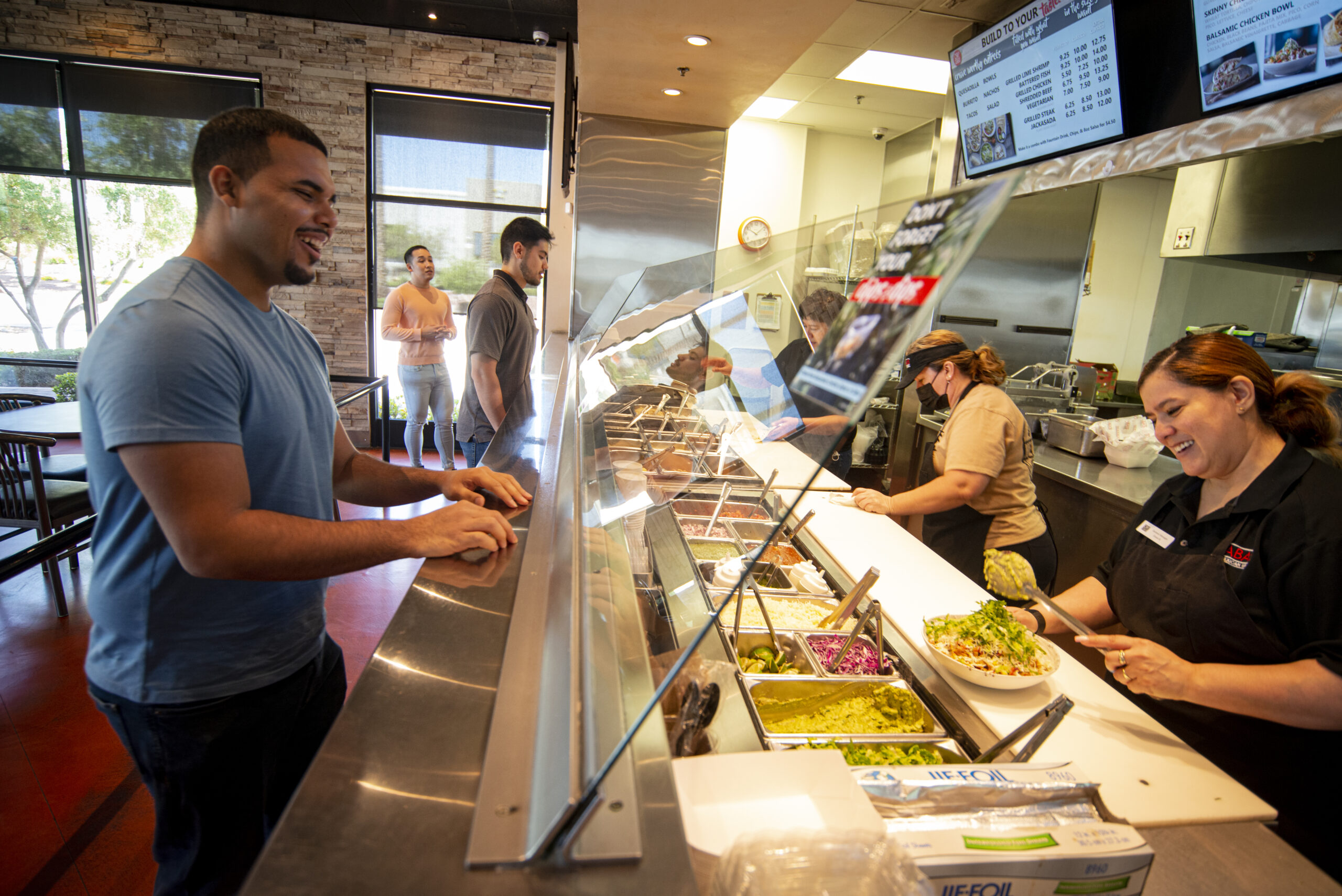 Ori'Zaba's customer ordering in line